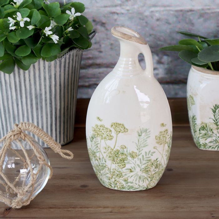 Laval Kanne mit Blumen