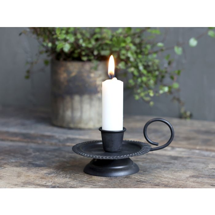 Chamberstick on foot for short dinner candle